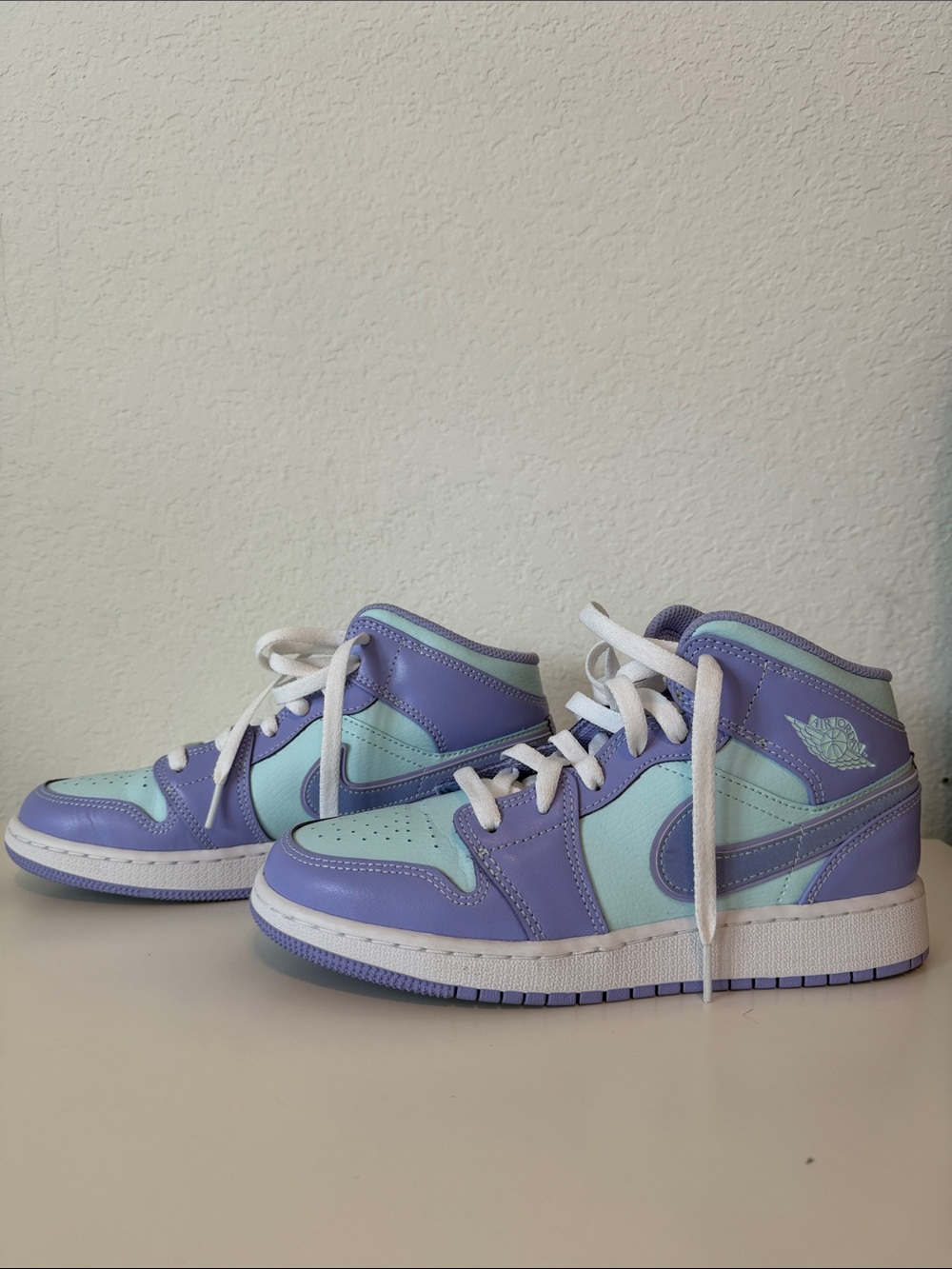 Nike Mid-Top Air Jordan in Lavender and Mint - 5.5 big kids (6.5 women’s)